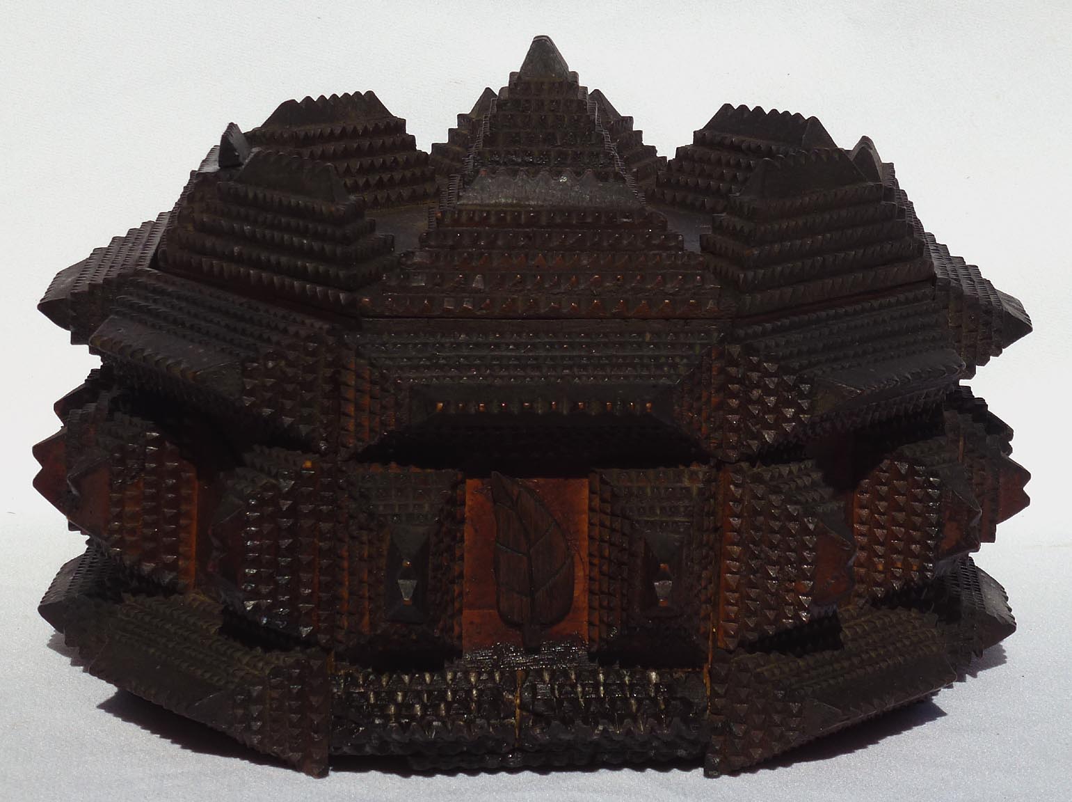 Octagonal tramp art box with leaves