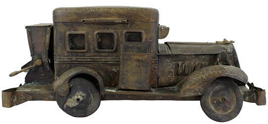 Intricate folk art metal car box